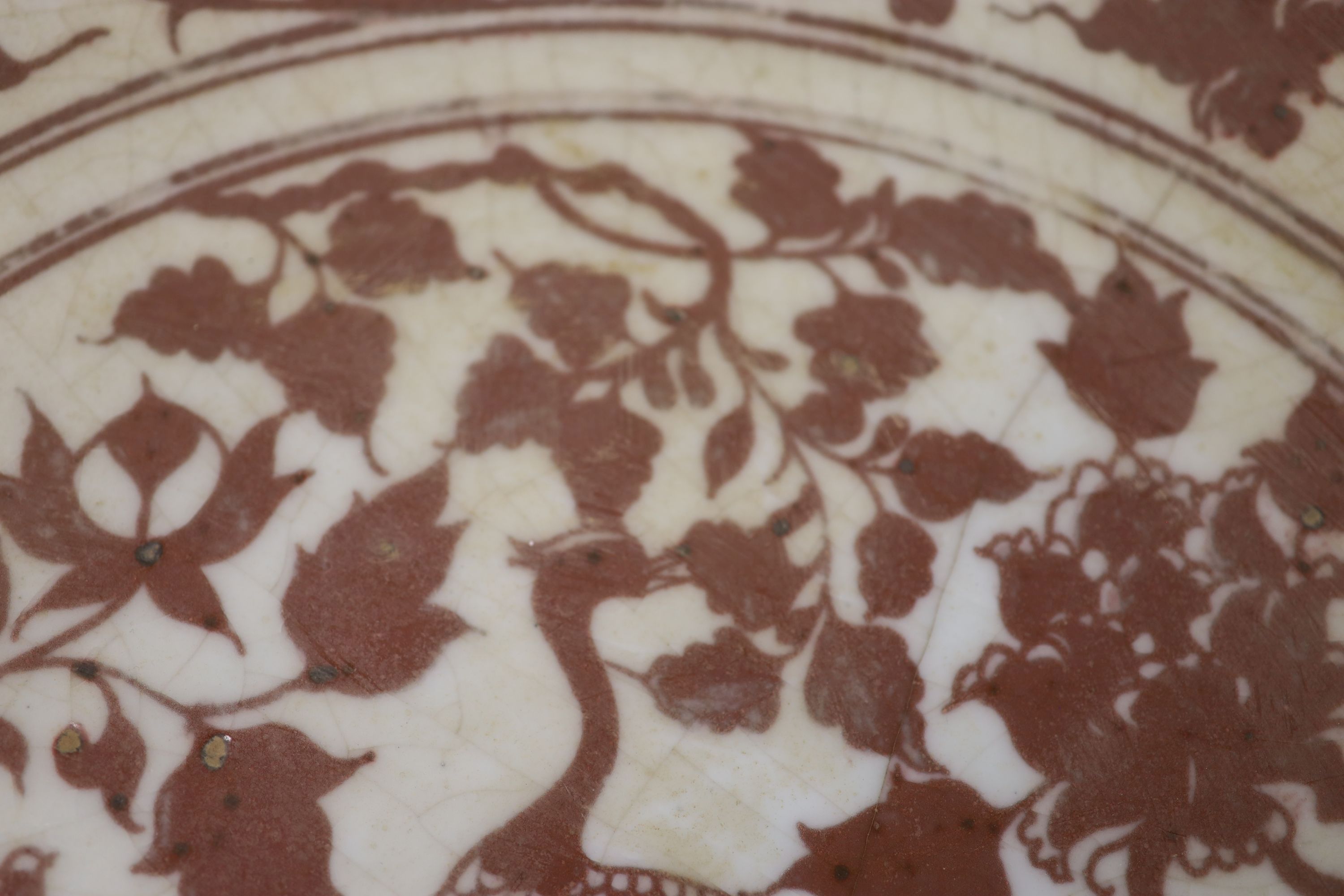 A large Chinese underglaze copper red charger, diameter 53cm